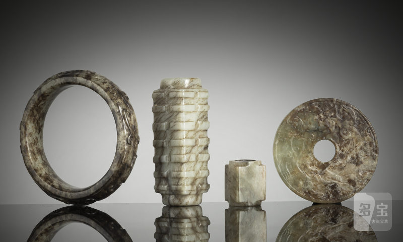 A group of eight jade carvings, some in archaic forms such as 'cong' etc.